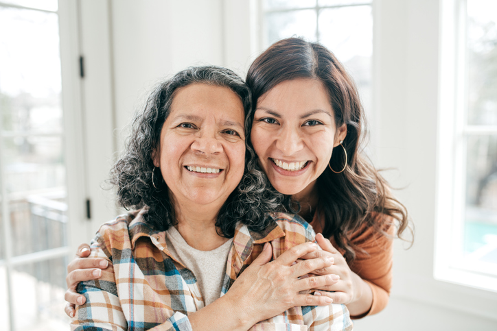 Two women smiling