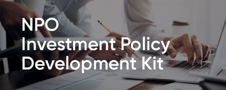 Image of two colleagues working in front of a computer with the title Investment policy kit. 