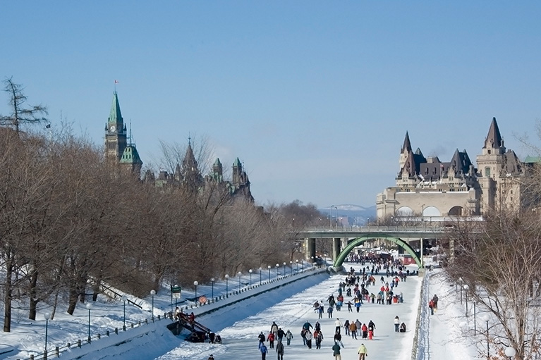 people skating on the rideau canal in the winter