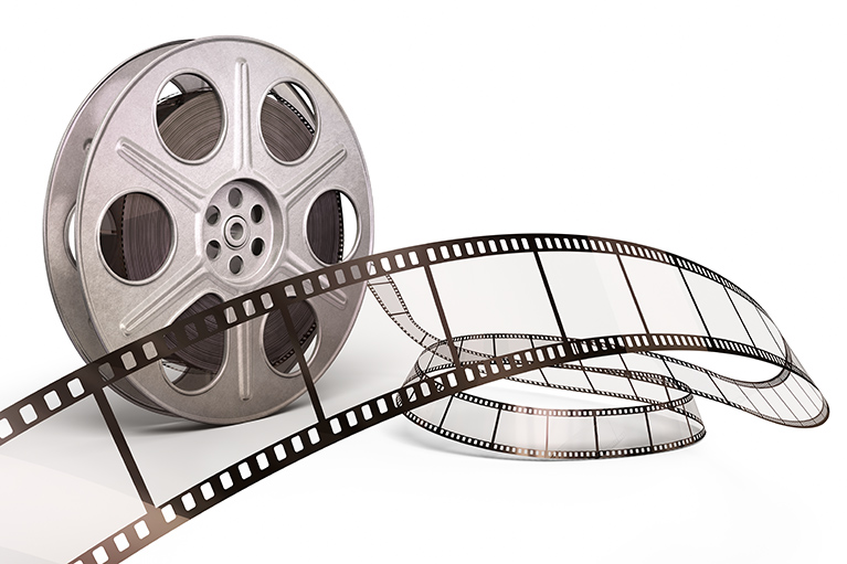 35mm film strip and reel isolated on white background