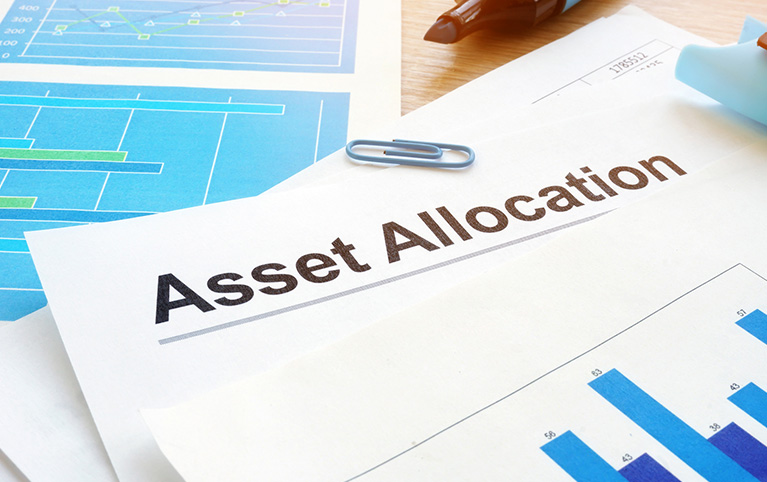 pieces of paper showing graphs with title of "Asset Allocation"
