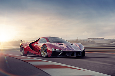 red race car on a track with sun setting behind it