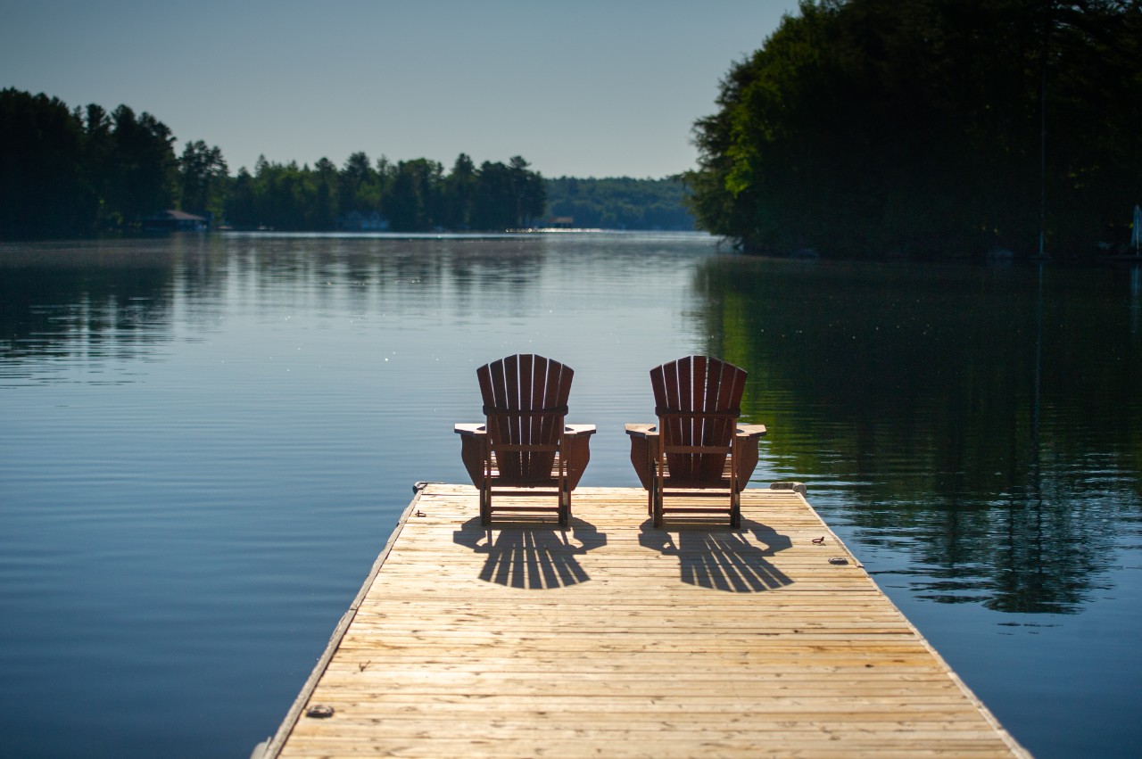 two chairs on a dock