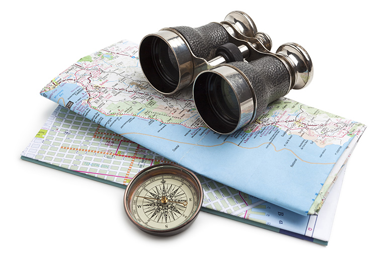 Binoculars, compass, roadmaps