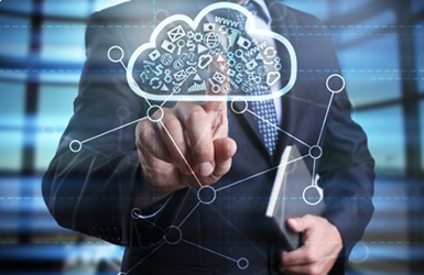 A man presses a cloud on a digital screen.