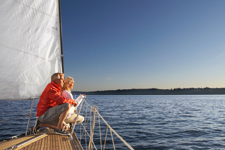 A man and woman on a sailing ship.