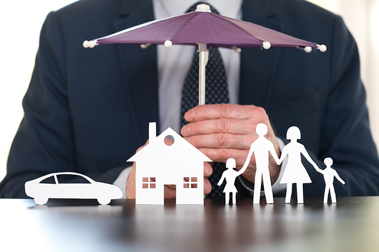 A man holding a small Umbrella.