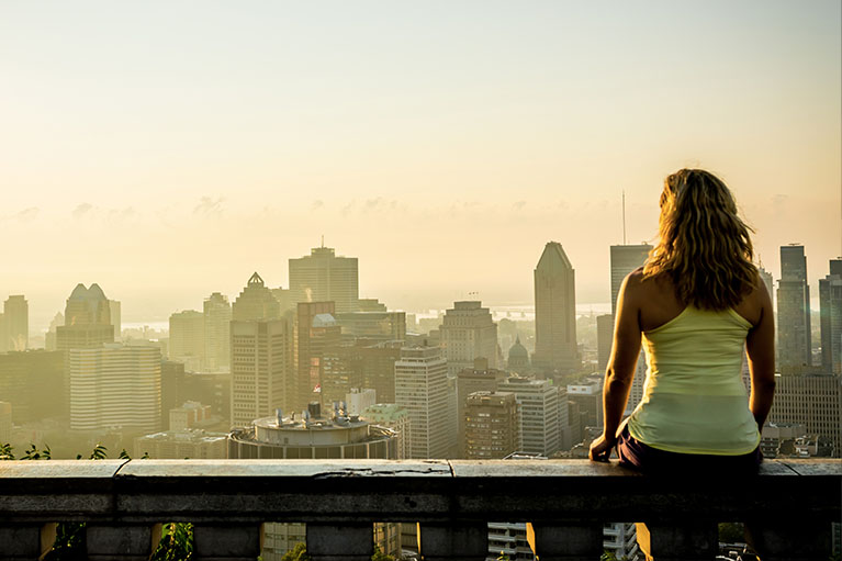A woman admiring the view of Montreal