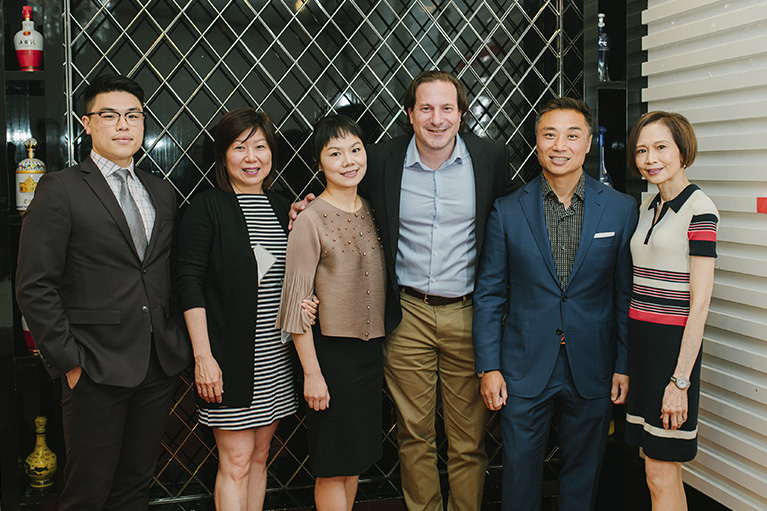 image of the team with the minister of immigration, from left to right, richard, tina c, tina y, minister of immigration marco mendicino, johnny and cecilia.