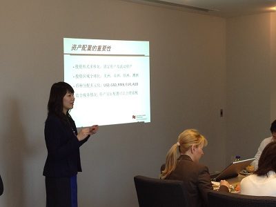 A woman talking at the Sprott Shaw seminar.