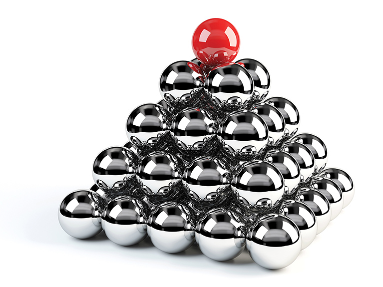A pyramid made up of silver metallic spheres and of a red sphere at the top.