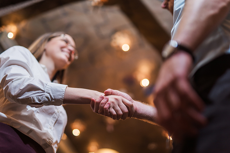 A man and a woman handshaking
