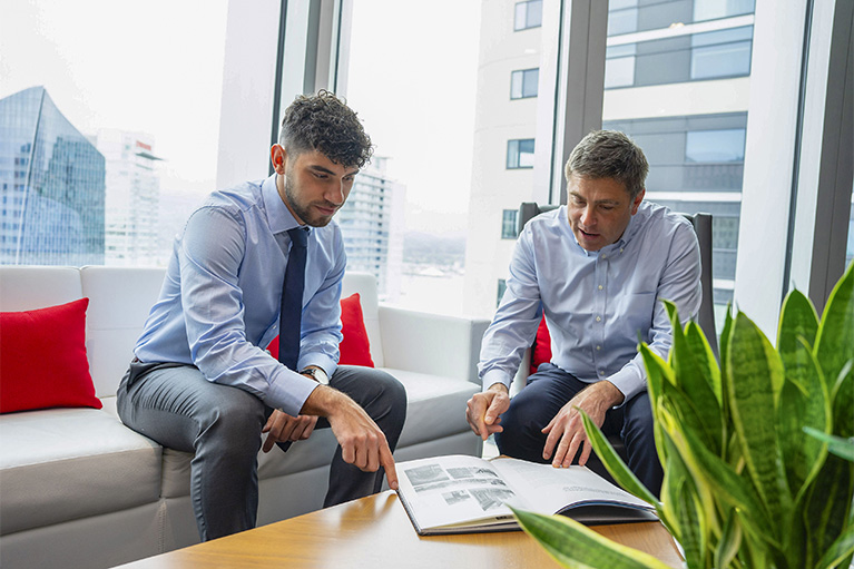 National Bank Financial Investment Advisors in a meeting. 