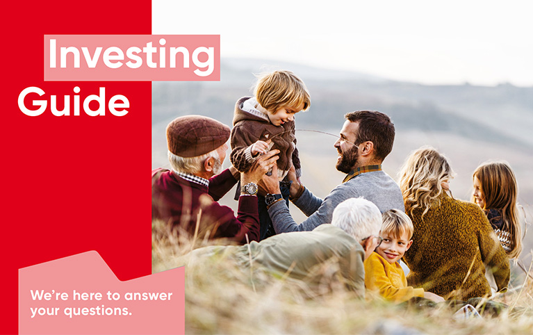National Bank Investing Guide with a family in a field