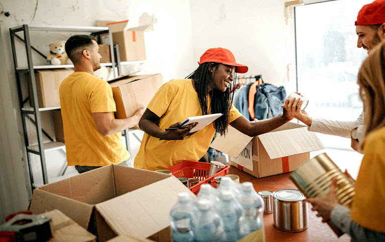 Team of volunteers working at a food bank