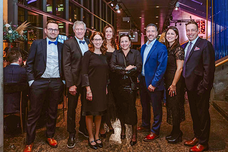 Photo of 8 people at the Foundation du Musée de la civilisation's banquet