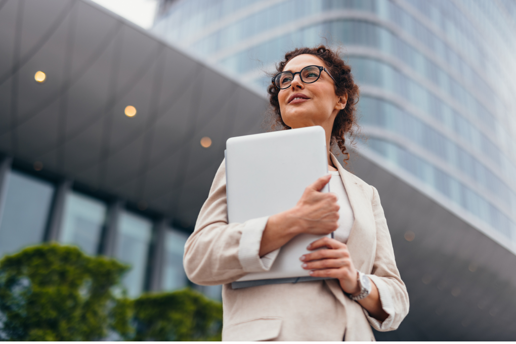 Photo of a National Bank Financial – Wealth Management advisor feeling confident with the backing of their corporate structure
